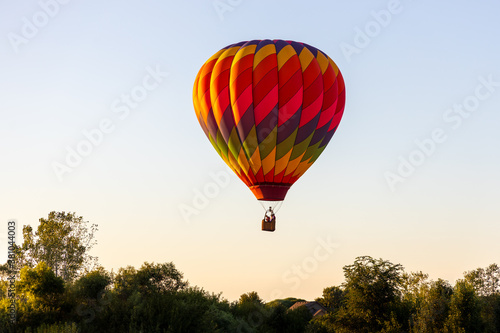 Balloon over trees © Scott