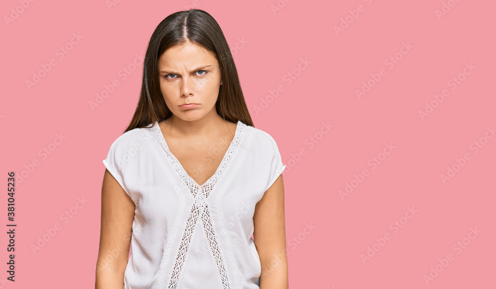 Obraz premium Young caucasian woman wearing casual clothes skeptic and nervous, frowning upset because of problem. negative person.