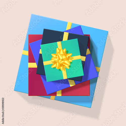 Stack of colored gift boxes with golden ribbons and bow tie. Vector 3d illustration. Top-down view