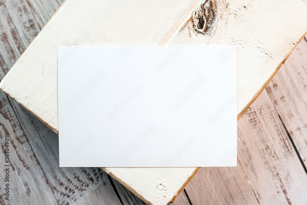 Photo of blank white card on a wooden block. Blank template for brand identity mock-up design, food theme. Presentation and portfolio template Photo of blank white card on a wooden block. Blank template for brand identity mock-up design, food theme. Presentation and portfolio template