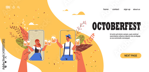 man woman in smartphone screens holding beer mugs Oktoberfest party celebration online communication self isolation concept horizontal portrait copy space vector illustration