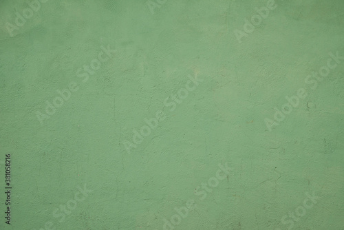 Old Green Grunge Plaster Texture Wall Background. Green wall background