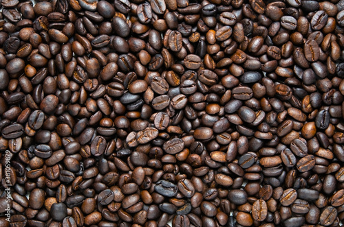Background of dark roasted coffee beans. Food