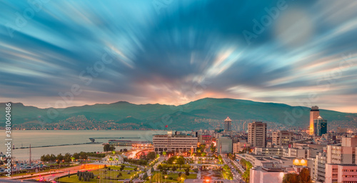 View from Varyant image of    Coastal cityscape with modern buildings at sunset - Izmir, Turkey photo