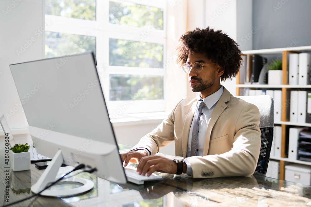 African American Business Man Using Computer African American Business Man Using Computer