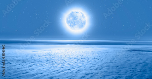 Night sky with moon over the clouds  "Elements of this image furnished by NASA