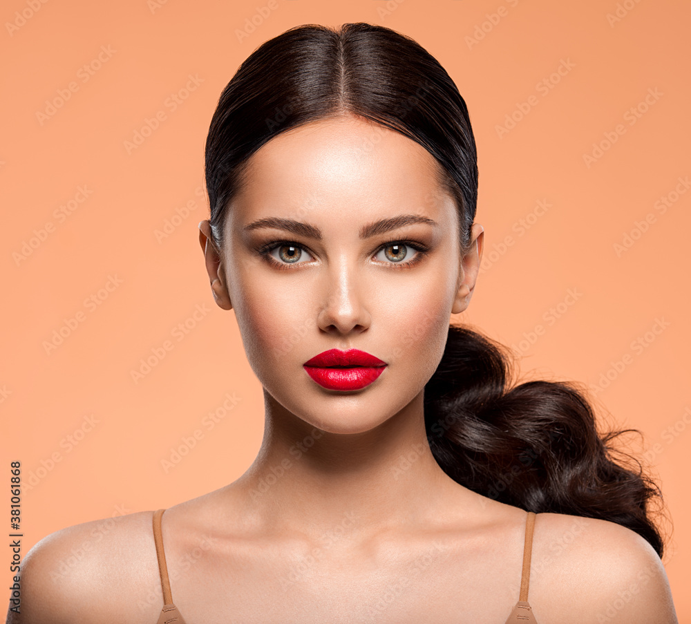 Beautiful white girl with a red lipstick on lips. Stunning brunette girl with long black hair. Beautiful white girl with a red lipstick on lips. Stunning brunette girl with long black hair.