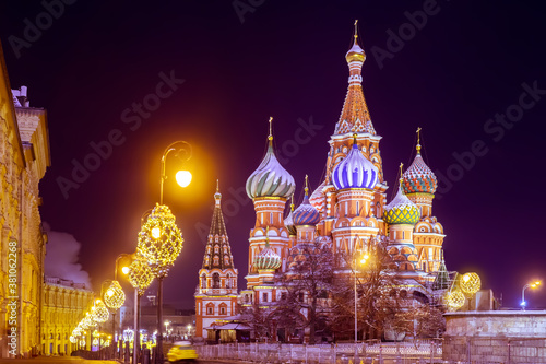St. Basil's Cathedral in Moscow. Sights of Russia. Streets of Moscow at night. Winter capital. Different-sized domes of St. Basil's Cathedral. Travels in evening Moscow. Christmas holidays in Russia.