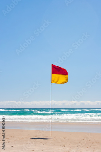 Lifesaving flag. Swimming flag on Australian beach
