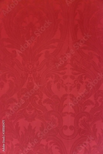 A red cloth with some awesome illustration crafted over it as an abstract art