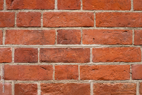 Classic red brick masonry wall pattern.
