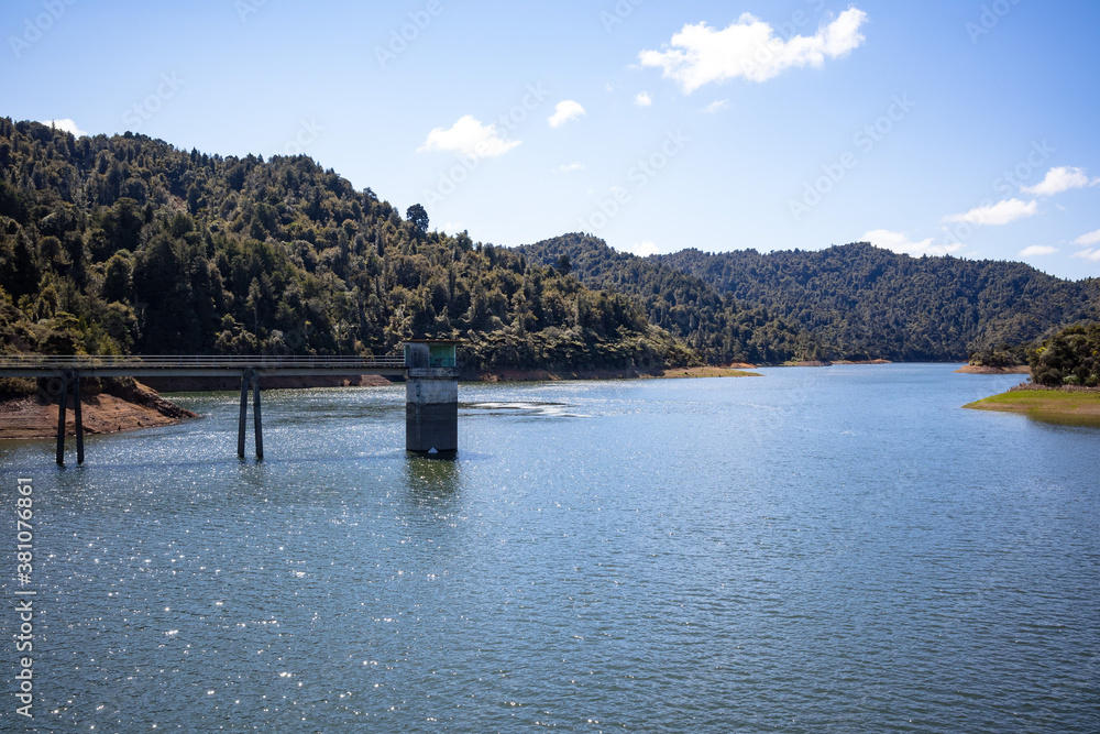 Wairoa Reservoir, Hunua Ranges, New Zealand on a spring day Wairoa Reservoir, Hunua Ranges, New Zealand on a spring day