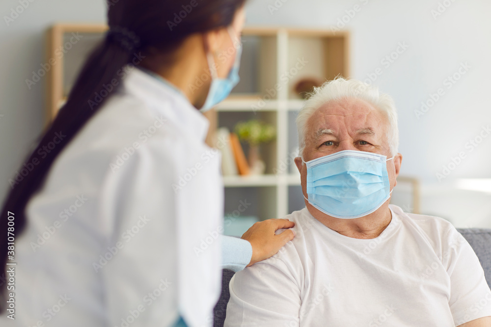 Woman doctor visits the elderly man and provides him with support during the quarantine. Woman doctor visits the elderly man and provides him with support during the quarantine.