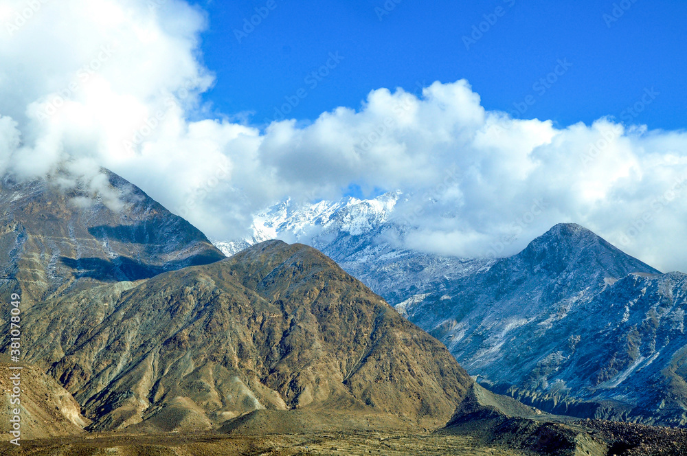 Karakoram highway among the glacial peaks 