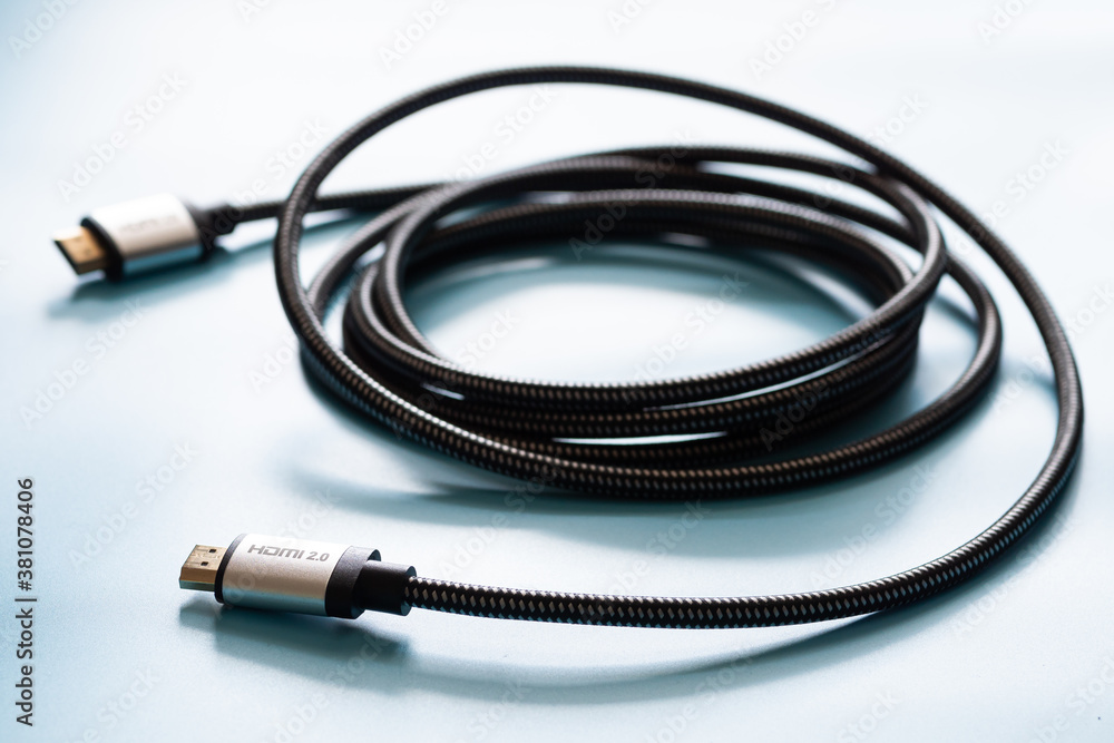 HDMI Cable connector and copy space on blue background color mood and tone style HDMI Cable connector and copy space on blue background color mood and tone style