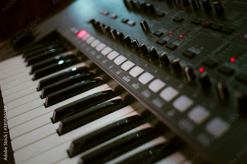 Synthesizer keys and sequencer close up