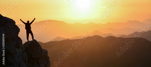 magnificent sunset, mountain climber watching, diving in peace