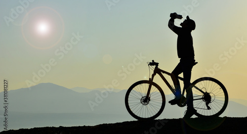 cyclist drinking water break