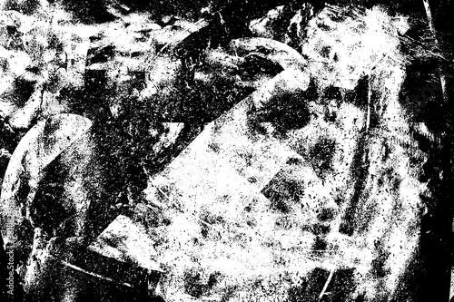 The grunge texture is black and white. Monochrome abstract background. Pattern of scratches  chips  and paint strokes. Black smudges  scuffing  wear and tear