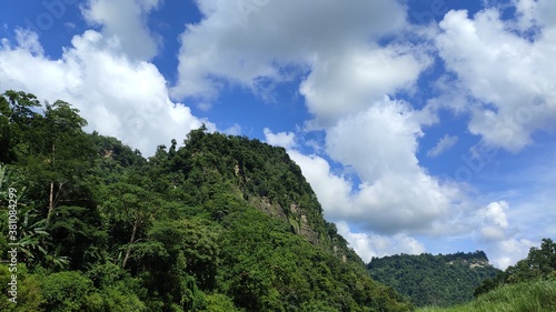 mountains cloudy sky river