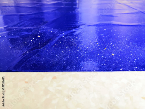 Blue Multi Layer Sticky Disposable Dust Removal Mat. Selective Focus On Dust