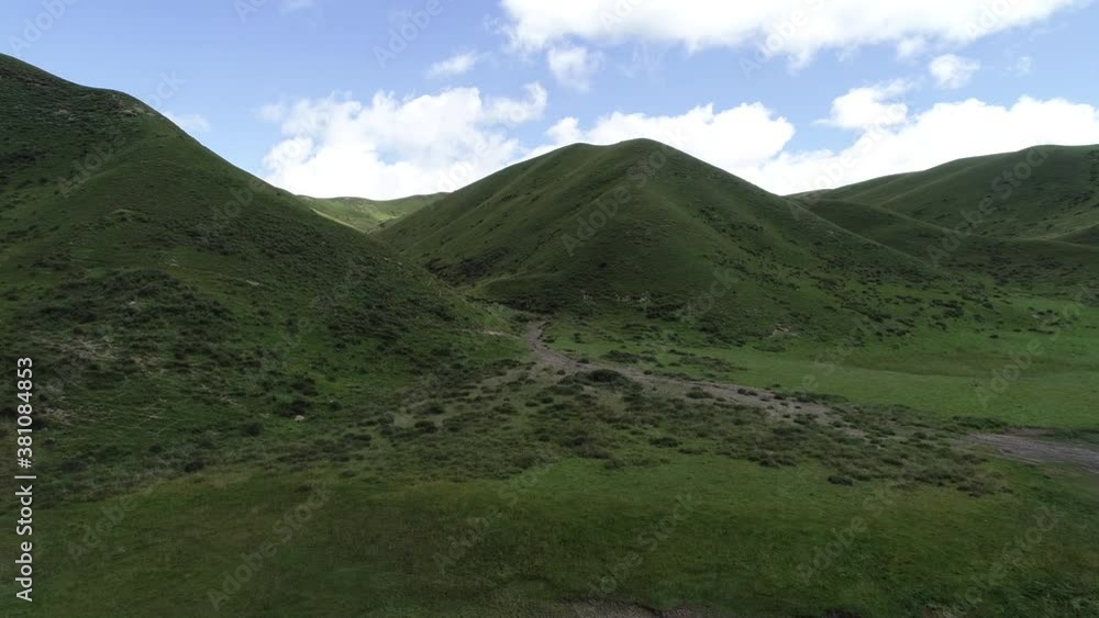 High altitude mountains with grassland landscape High altitude mountains with grassland landscape