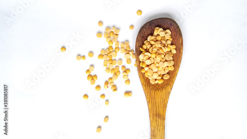 Yellow split mung bean dal on spoon isolated 