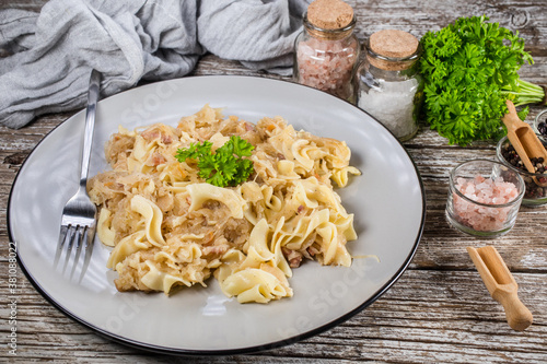 Pasta with sauerkraut and bacon. photo