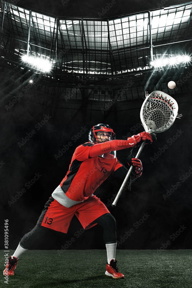 Lacrosse Player, athlete sportsman in red helmet on grand arena background.  Sport and motivation wallpaper. Stock Photo | Adobe Stock