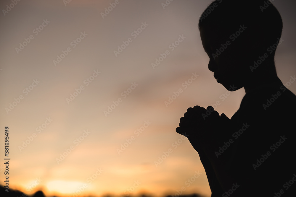 A little prayer, A boy is praying seriously and hopefully to Jesus, Pay respect prayer concept for faith spirituality and religion. Religious beliefs Christian life crisis prayer to god.