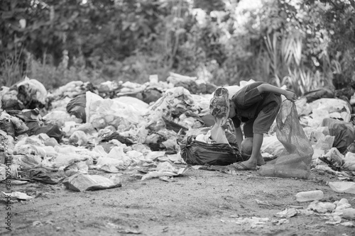 Child labor. Children are forced to work on rubbish. Poor children collect garbage. Poverty, Violence children and trafficking concept,Anti-child labor, Rights Day on December 10.