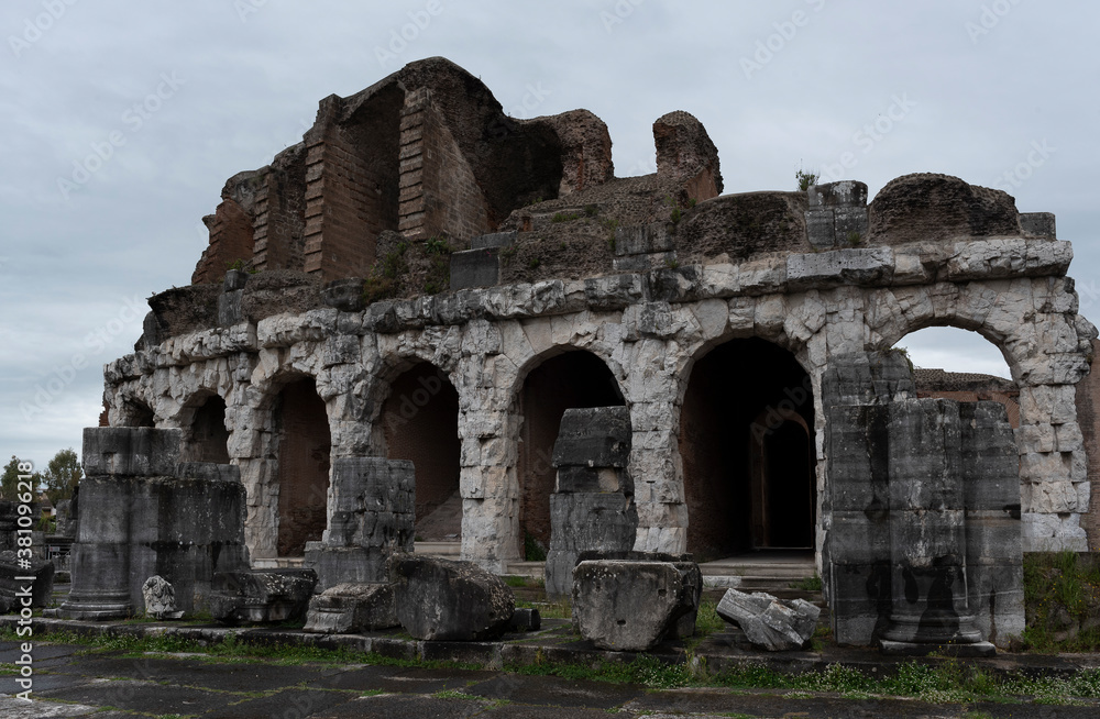 Roman amphitheater, ancient ruins, view of the city of Santa Maria Capua Vetere. Italy. Rainy day.