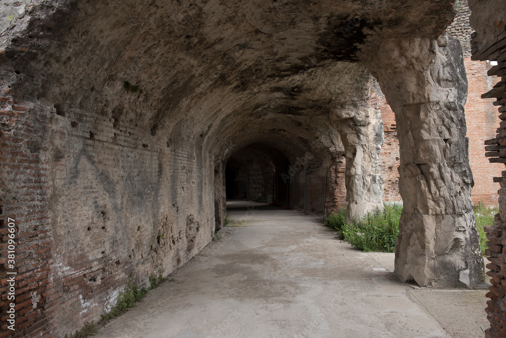 Roman amphitheater, ancient ruins, view of the city of Santa Maria Capua Vetere. Italy. Rainy day.