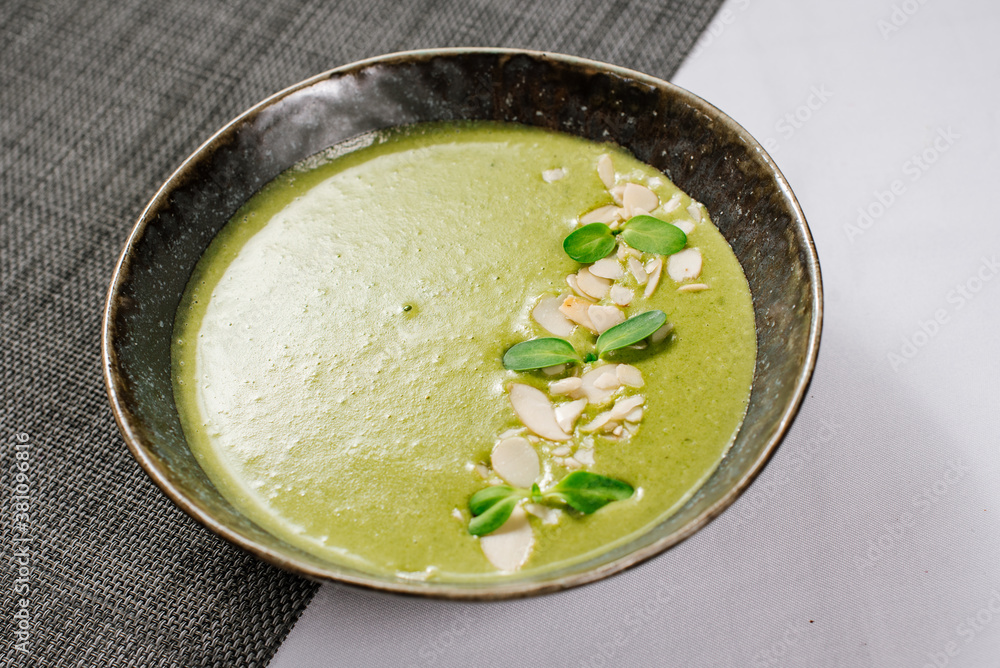 Green spinach cream soup close up Green spinach cream soup close up