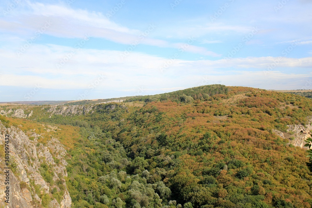 Rocks in the vicinity of the Orlova Chuka cave and the Cherni Lom river in Bulgaria in autumn