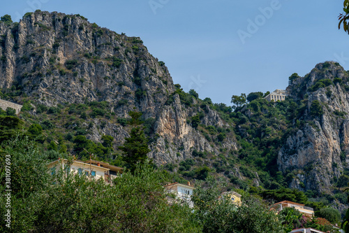 Luxury houses in the fantastic mountain view at sunny day in Beaulieu-sur-Mer, France. Summer day