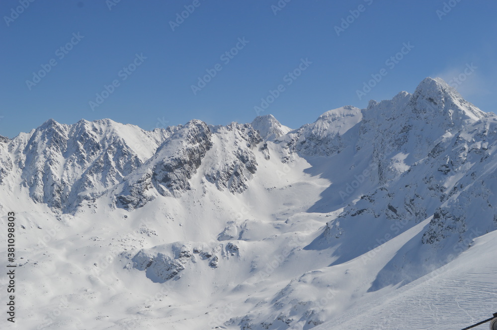 Skiing and snowboarding in the Jasna and Zakopane ski resorts between Poland and Slovakia in the Tatra Mountains