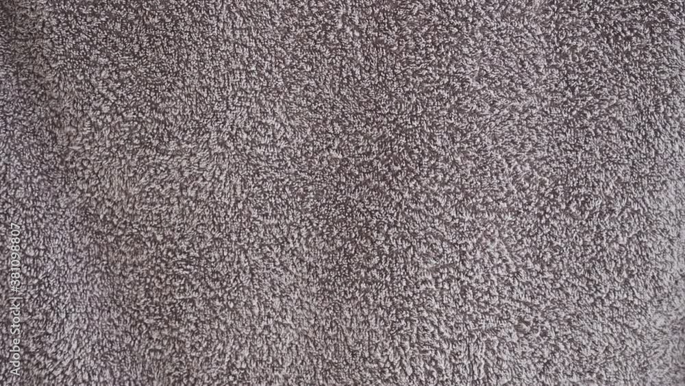 gray towel background texture with wind blowing. soft cloth hanging and waving. gray towel background texture with wind blowing. soft cloth hanging and waving.