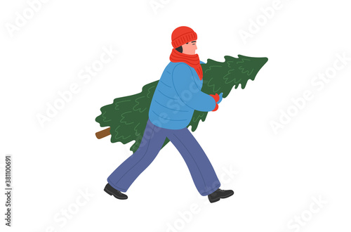 A man carries a Christmas fir tree. A hurrying guy in warm clothes walks and holds a fir tree.  Winter holidays.