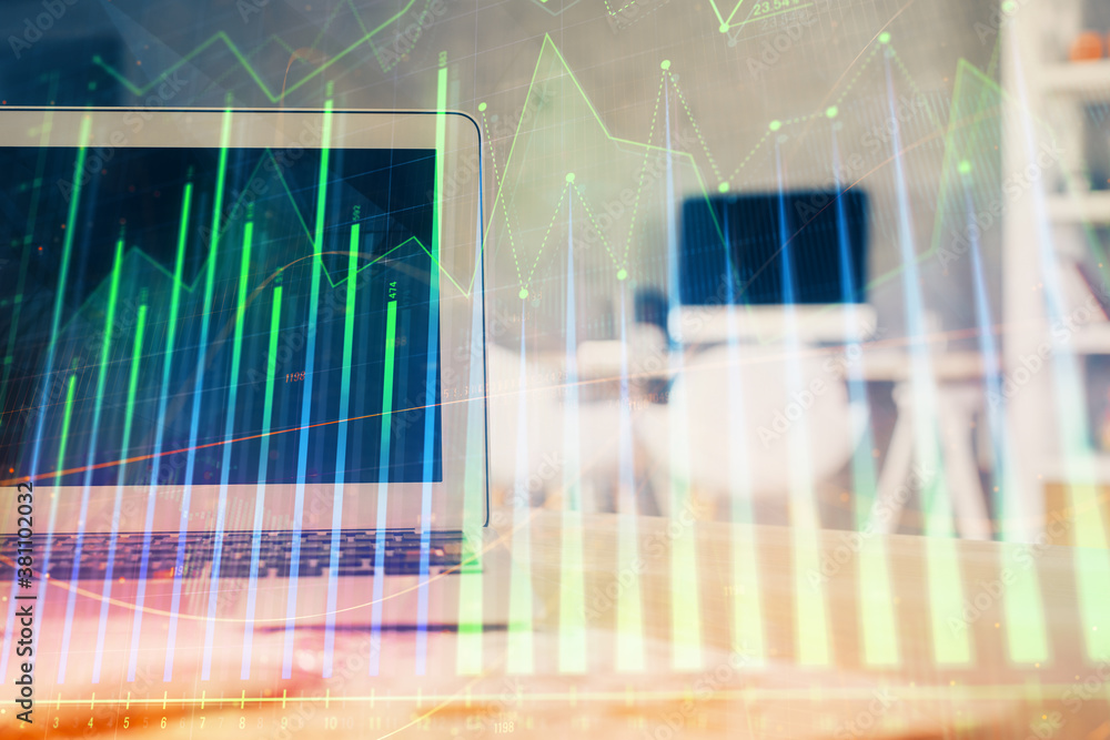 Forex Chart hologram on table with computer background. Double exposure. Concept of financial markets. Forex Chart hologram on table with computer background. Double exposure. Concept of financial markets.