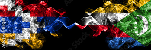Nagorno-Karabakh  Artsakh vs Comoros  Comorian smoky mystic flags placed side by side. Thick colored silky abstract smoke flags