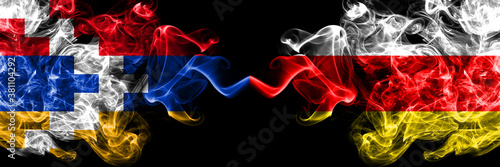 Nagorno-Karabakh, Artsakh vs South Ossetia smoky mystic flags placed side by side. Thick colored silky abstract smoke flags