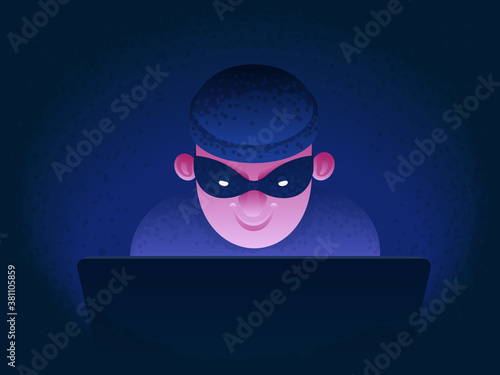Internet fraud. Hacker behind a laptop monitor. Phishing and online surveillance. Identity theft and hacking of bank
