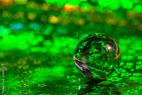 glass ball on shiny background
