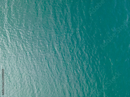 Drone shot over water. Background of lake. Birds view. Copy Space