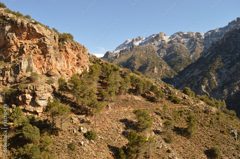 Hiking in the stunning valleys of the Sierra Nevada mountain range in Southern Spain