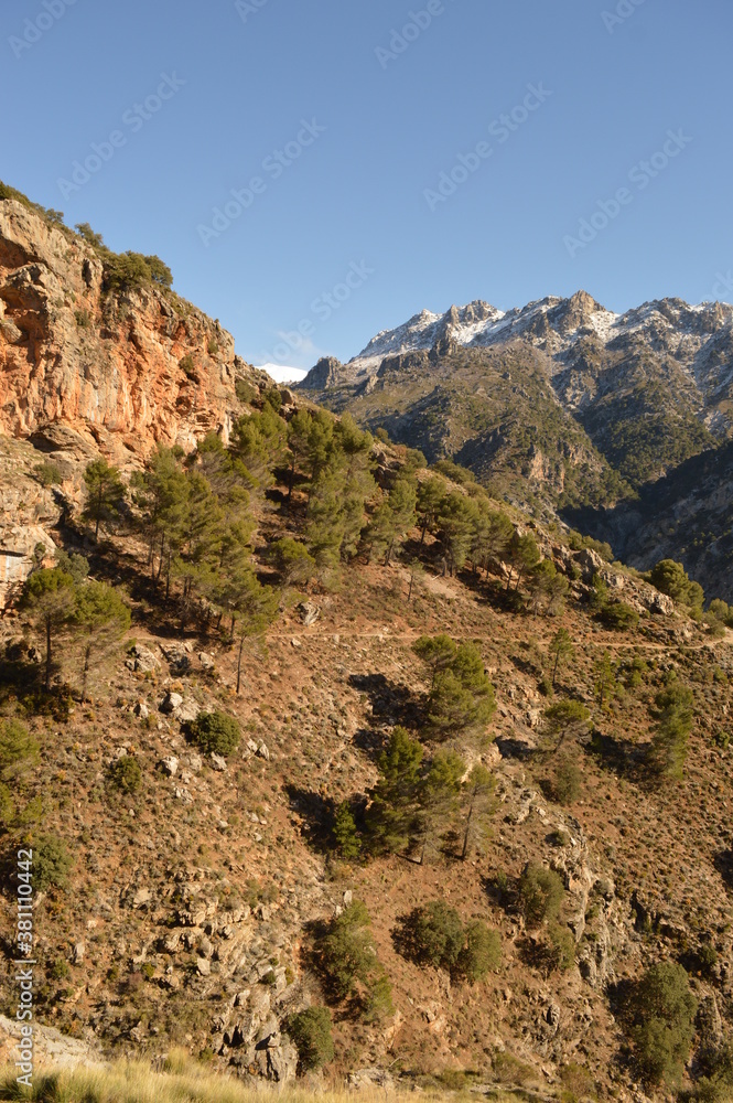 Hiking in the stunning valleys of the Sierra Nevada mountain range in Southern Spain