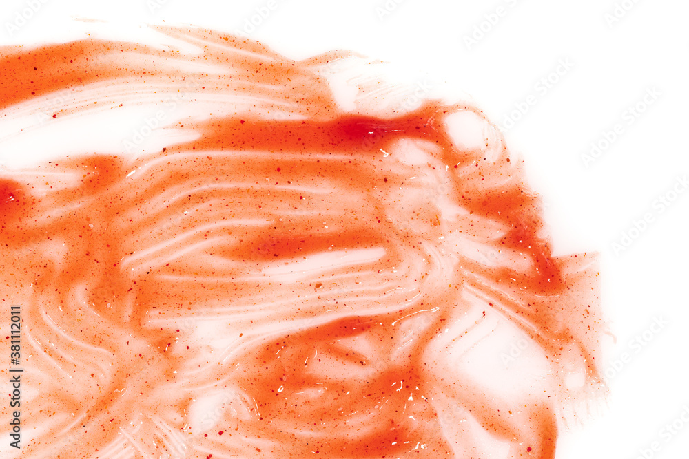 Tomato ketchup sauce  on a white background. Spots and stripes ketchup texture