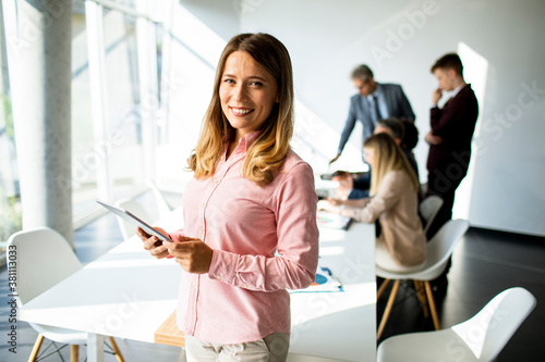 Young business woman using ...
