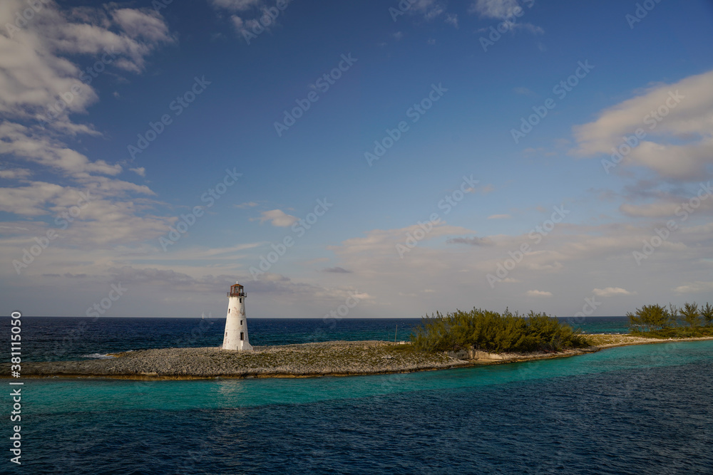 Amazing lighthouse at the reef of Nassau Bahamas on the calm, or wavy sea.